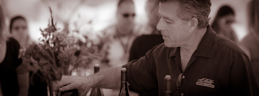 Michael Talty pouring wine